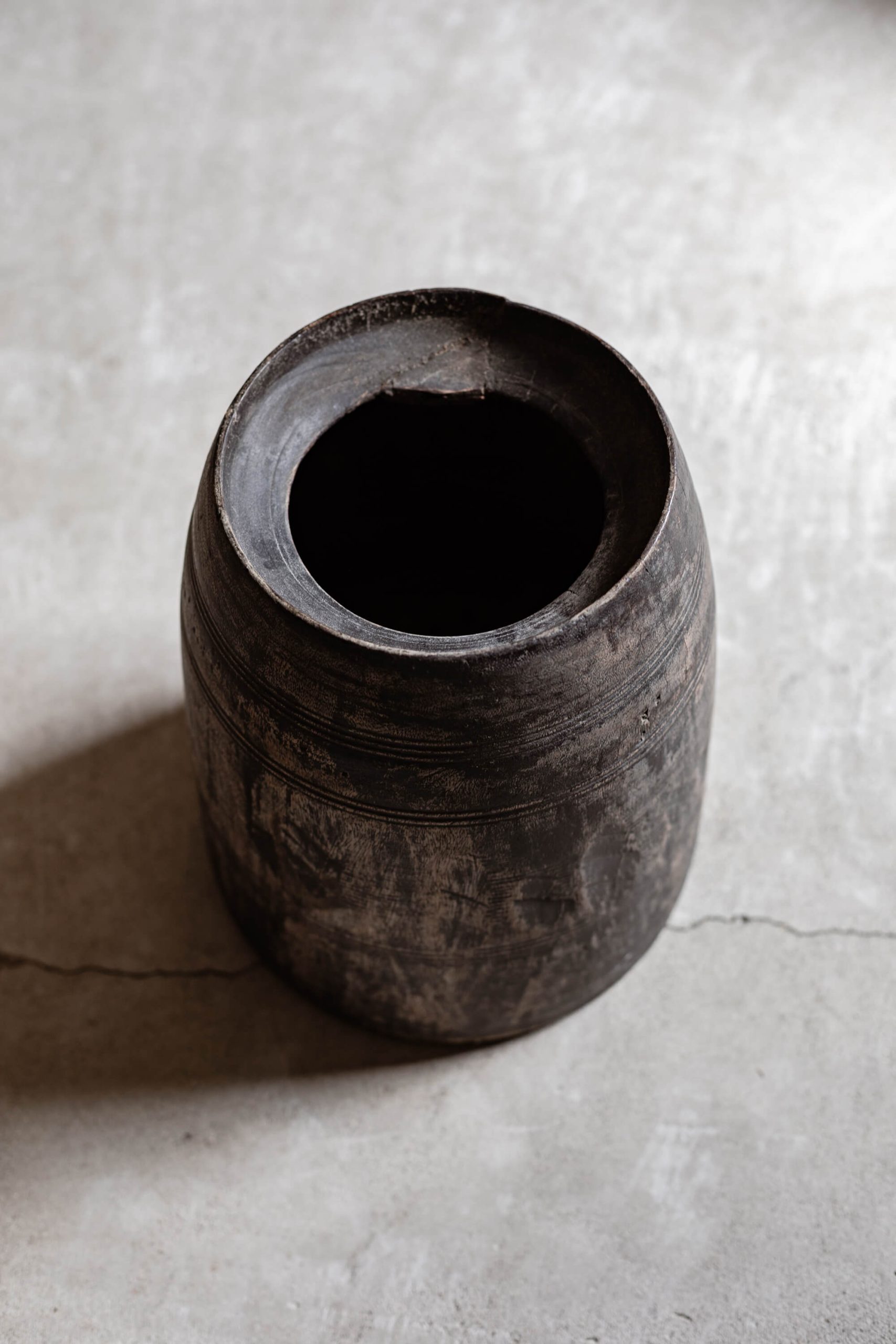 Vintage tall wooden barrel pot with natural worn finish, styled outdoors in a Mediterranean garden — Soulosofie Mallorca