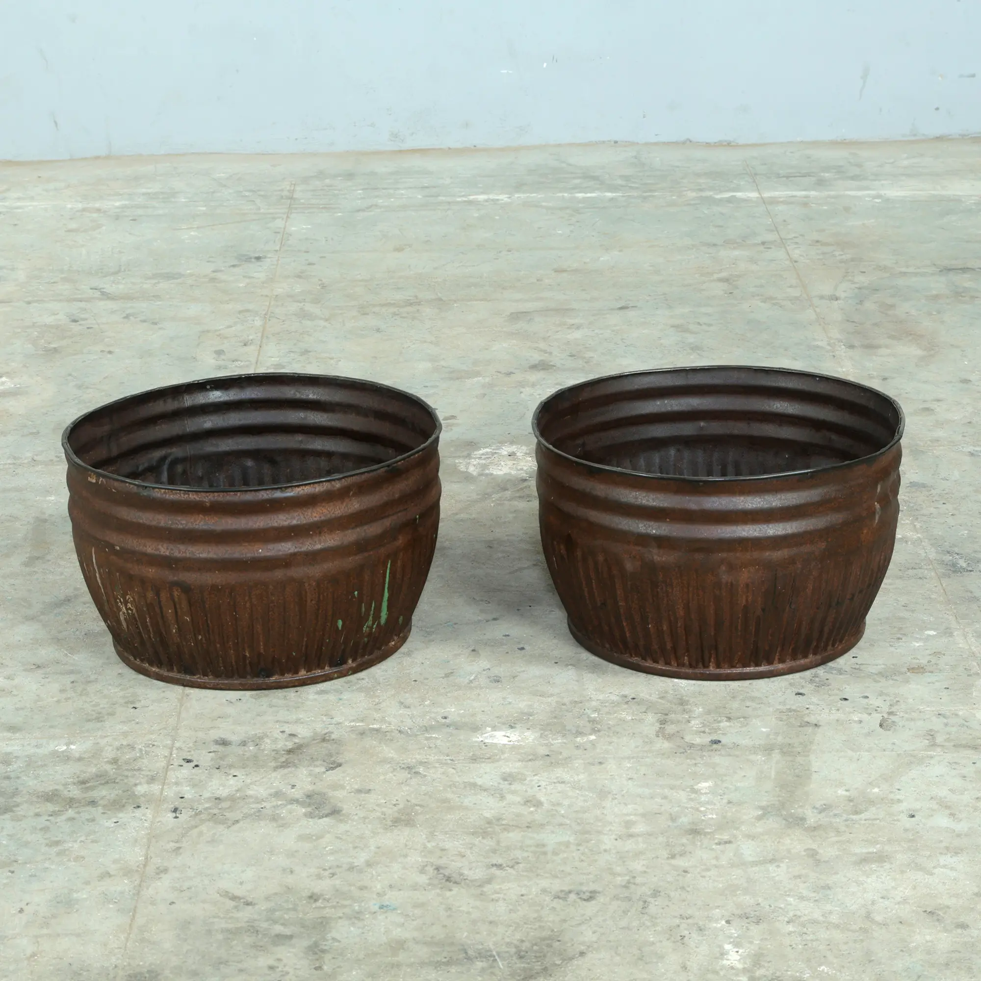 Fabulous pots made from reclaimed iron. Great to use as planters or storage