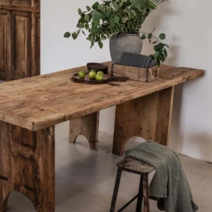 Wooden dining table in reclaimed wood