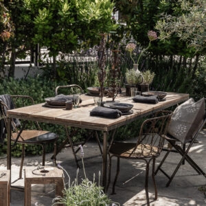 Reclaimed wood and iron outdoor dining table 200cm styled for outdoor terrace dining with vintage chairs and ceramics — Soulosofie Mallorca