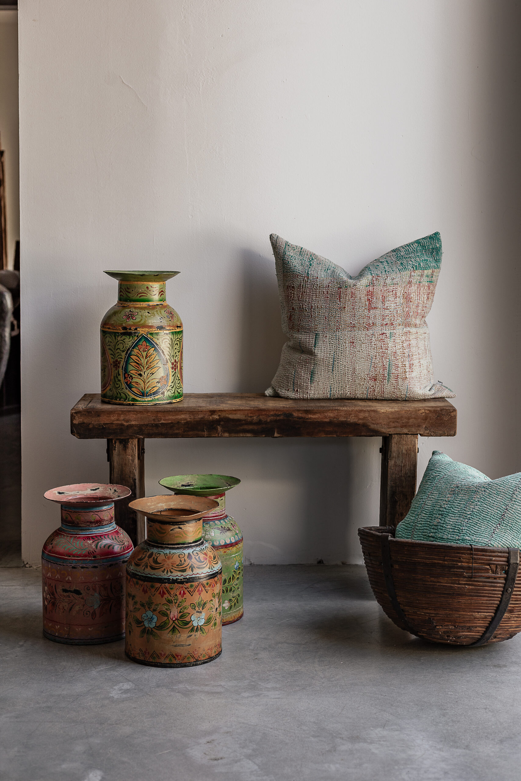 Vintage reclaimed wood bench with natural worn finish, styled with colourful Indian handpainted pots and kantha cushion — Soulosofie Mallorca