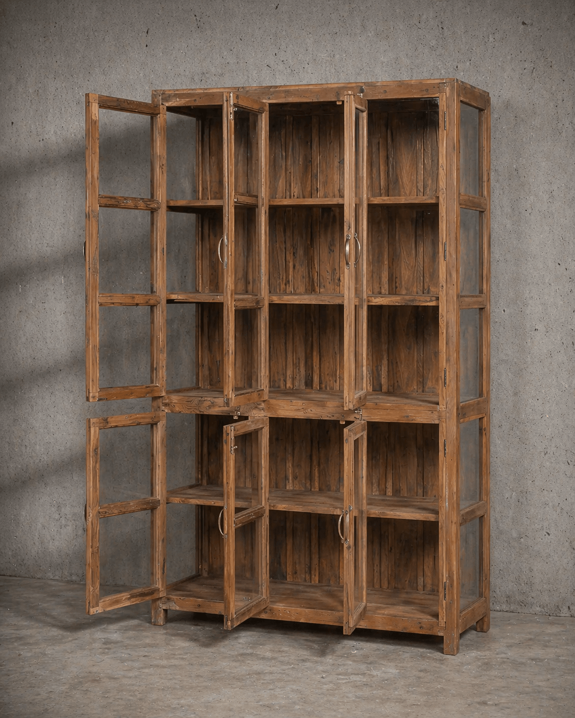 Vintage teak cabinet with glass doors and natural patina – a timeless piece for warm, rustic interiors