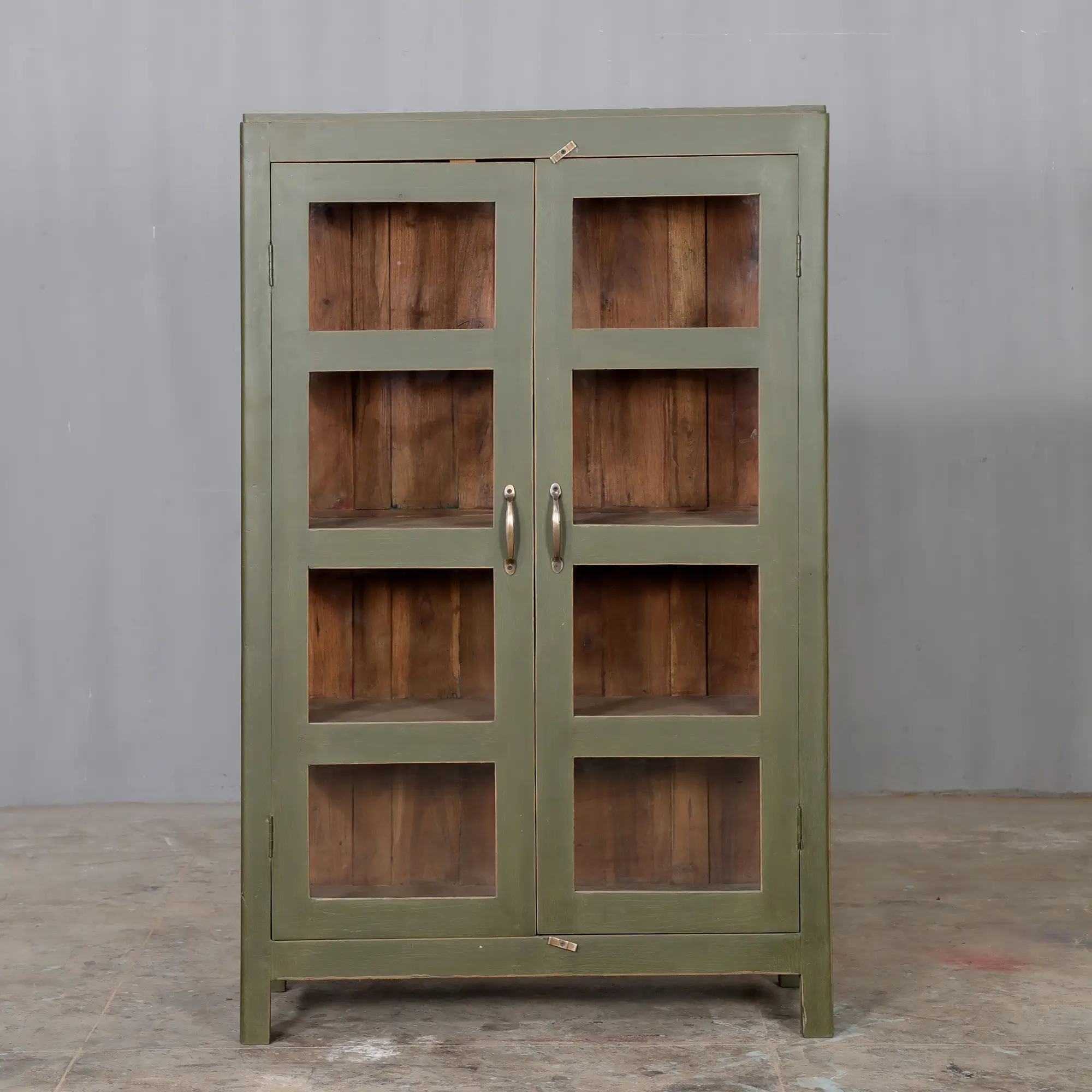 Vintage wooden cabinet in olive