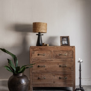Vintage teak chest of drawers with four drawers and brass handles, natural warm grain finish — Soulosofie Mallorca