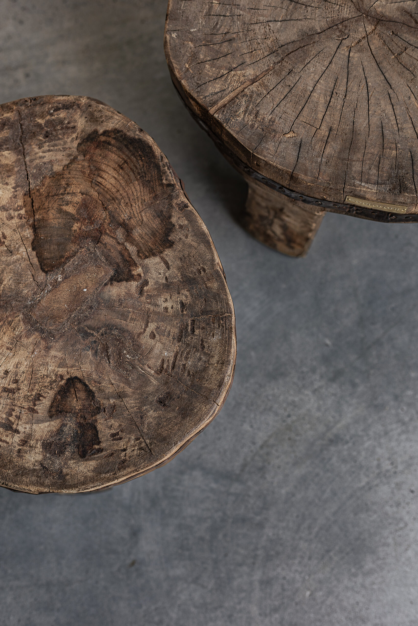 Pair of vintage Naga tribal solid wood stools from Nagaland with organic freeform top and chunky legs — Soulosofie Mallorca