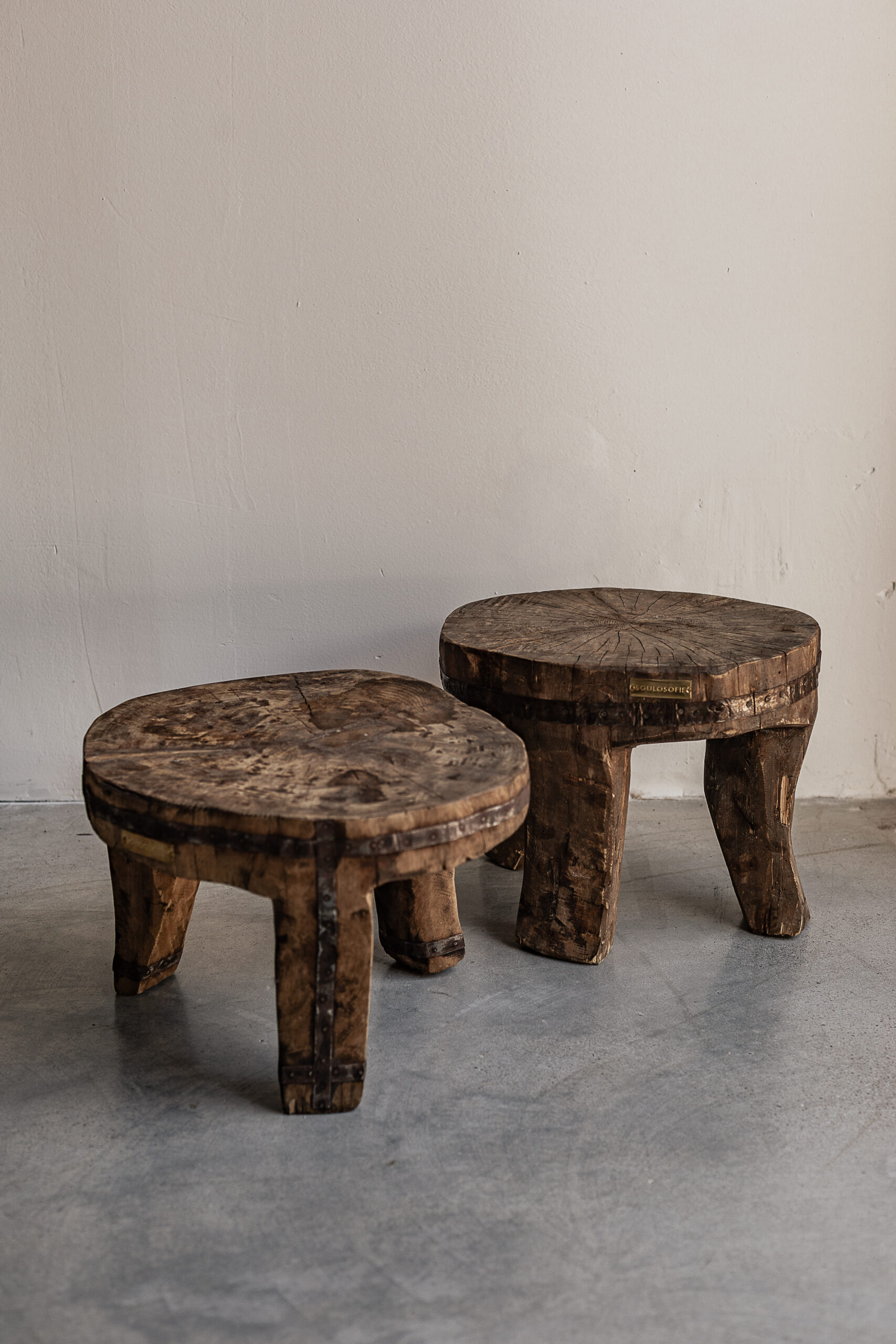 Pair of vintage Naga tribal solid wood stools from Nagaland with organic freeform top and chunky legs — Soulosofie Mallorca