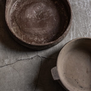 Vintage stone bowls with raw natural finish, small handled bowl alongside large round bowl — Soulosofie Mallorca