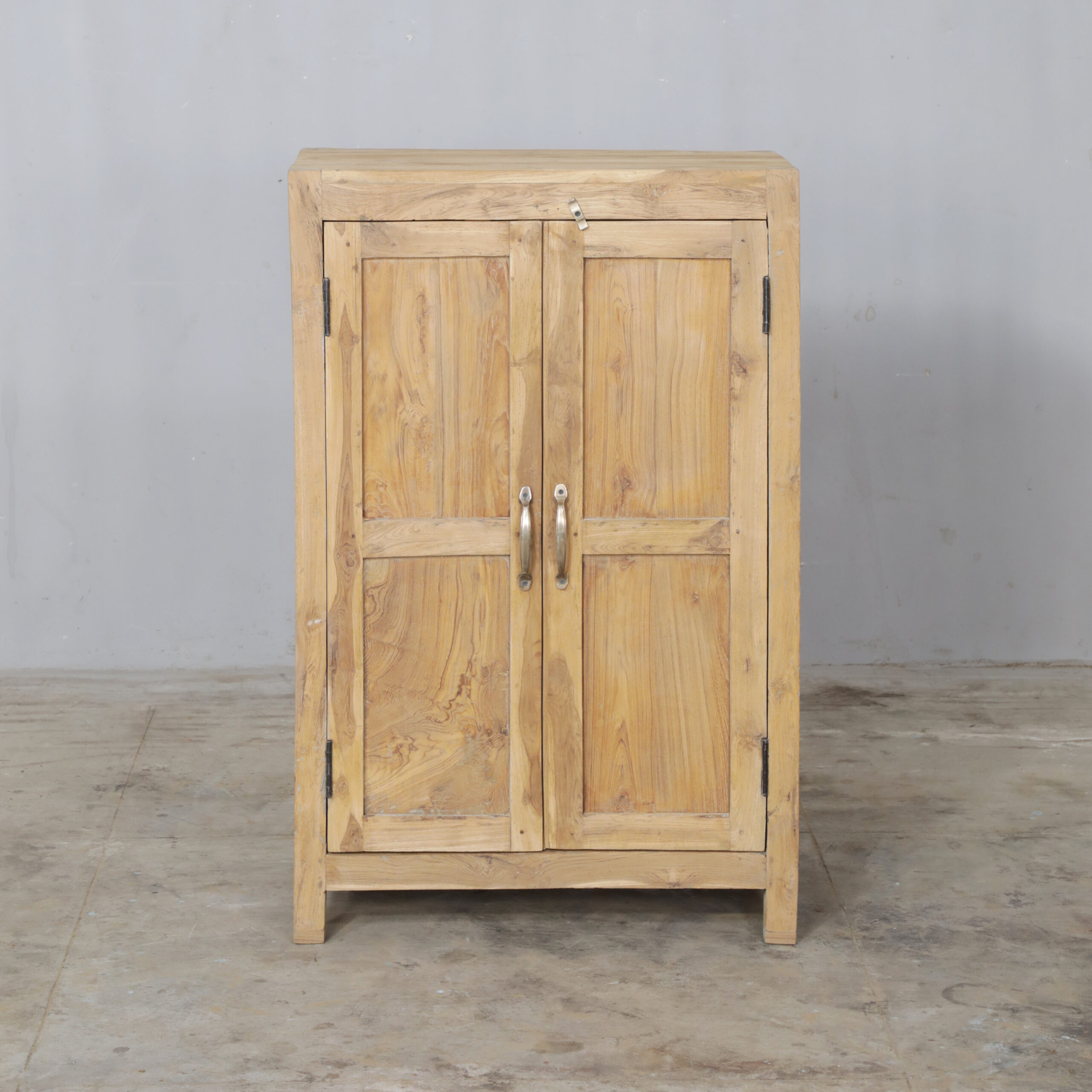 Small vintage cabinet, 69x30x105 cm, shallow enough for a hallway. Worn wooden doors. Shop at Soulosofie, Mallorca.